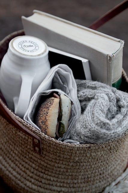 gift basket filled with books and tea