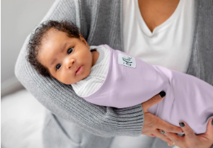 lilac Ollie swaddle on baby girl