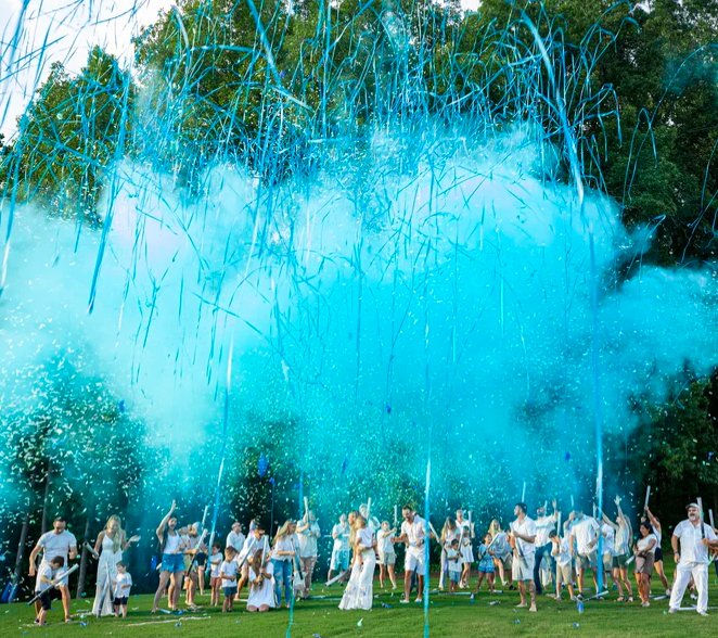 gender reveal streamers and powder cannons